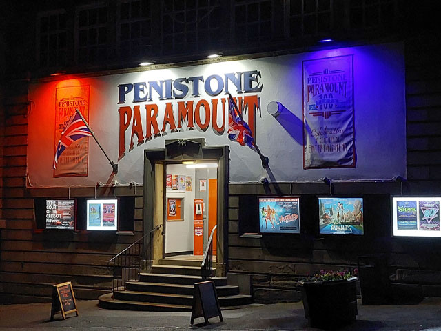 Penistone Paramount at night with Unions flags