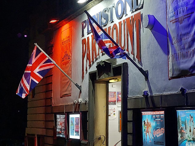 Penistone Paramount at night with Unions flags - detail